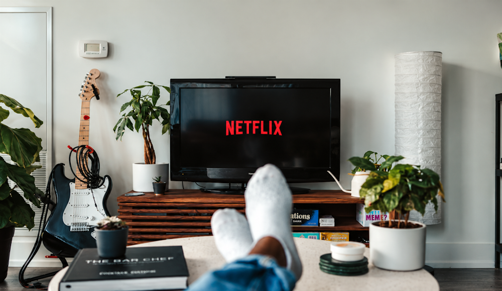 Cozy Netflix Lounge with Guitar and Plants