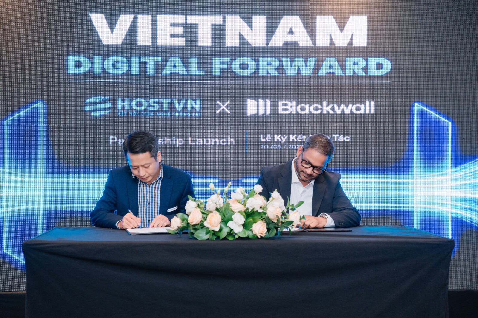 Mr. Madan Rai (Blackwall) and Mr. Vuong Duy Nam(HostVN) sign the MOU formalising Blackwall