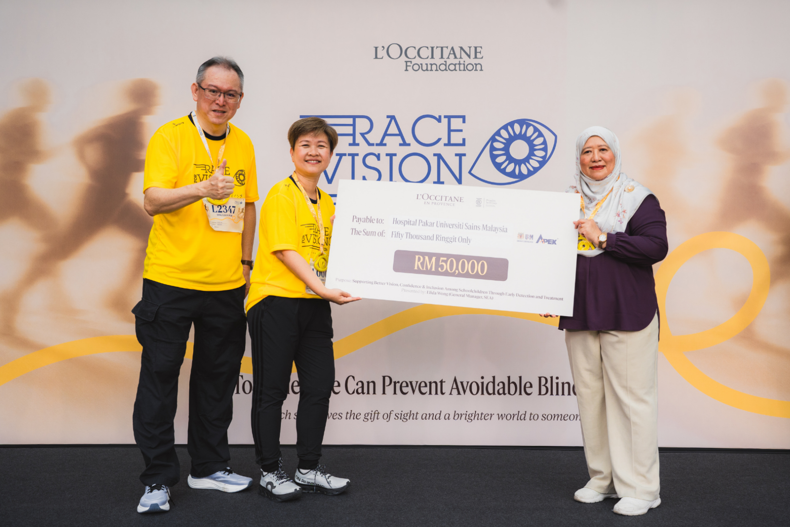 Mock cheque presentation by L