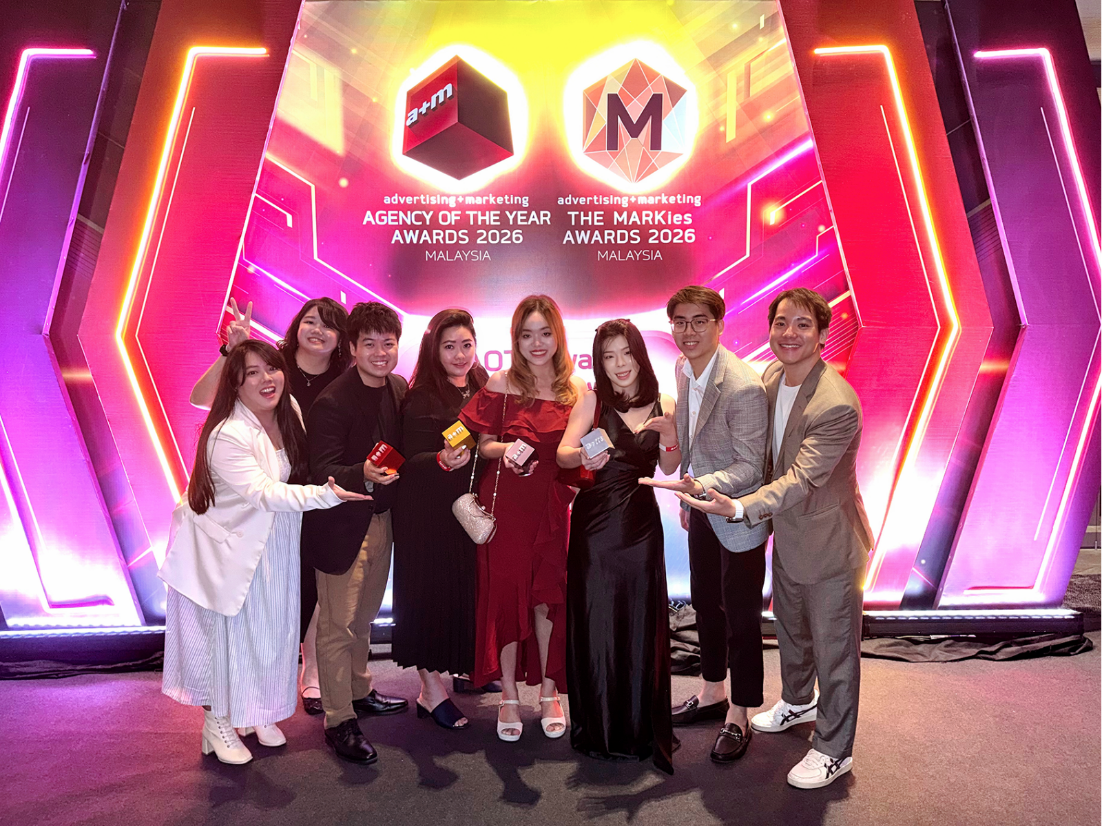 LOCUS-T team members celebrating the 4 honours at the Advertising + Marketing (A+M) Agency of the Year Awards 2026, reflecting the collective achievement and dedication behind the recognition.